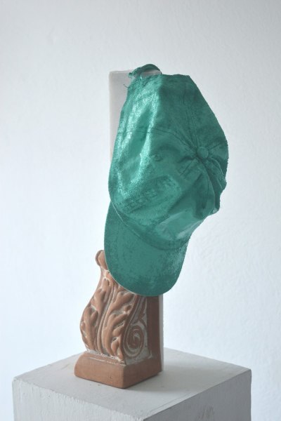 Dimitis Kontodimos_Felt familia, no cap I _2025_Marble, ceramic Jockey hat_37x15x10 cm